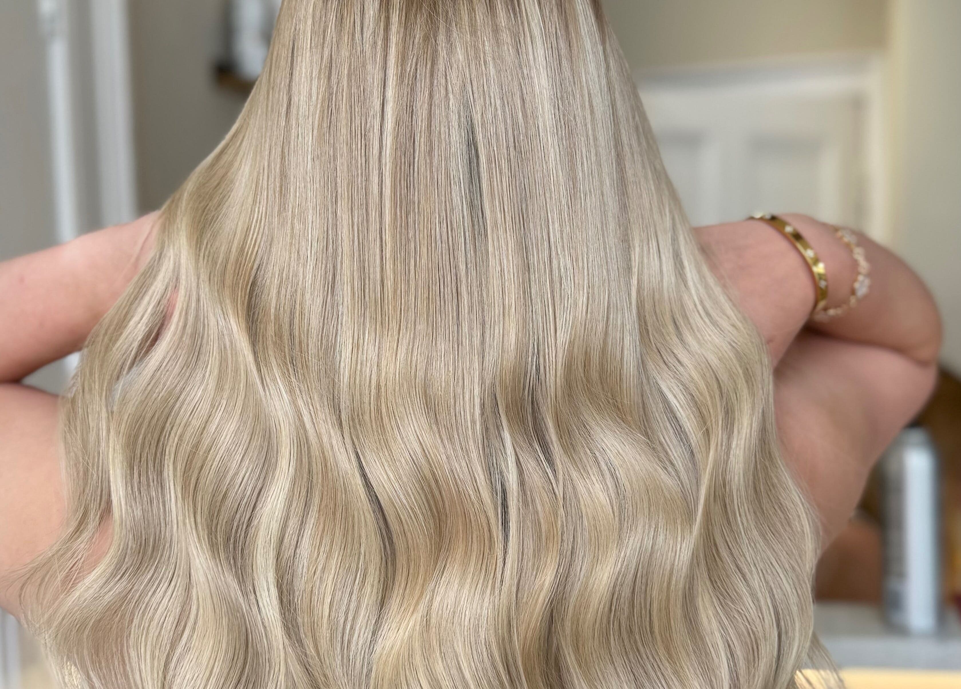 Long, blonde wavy hair styled at The Salon | Meg & Mabel in Hereford, England, GB.