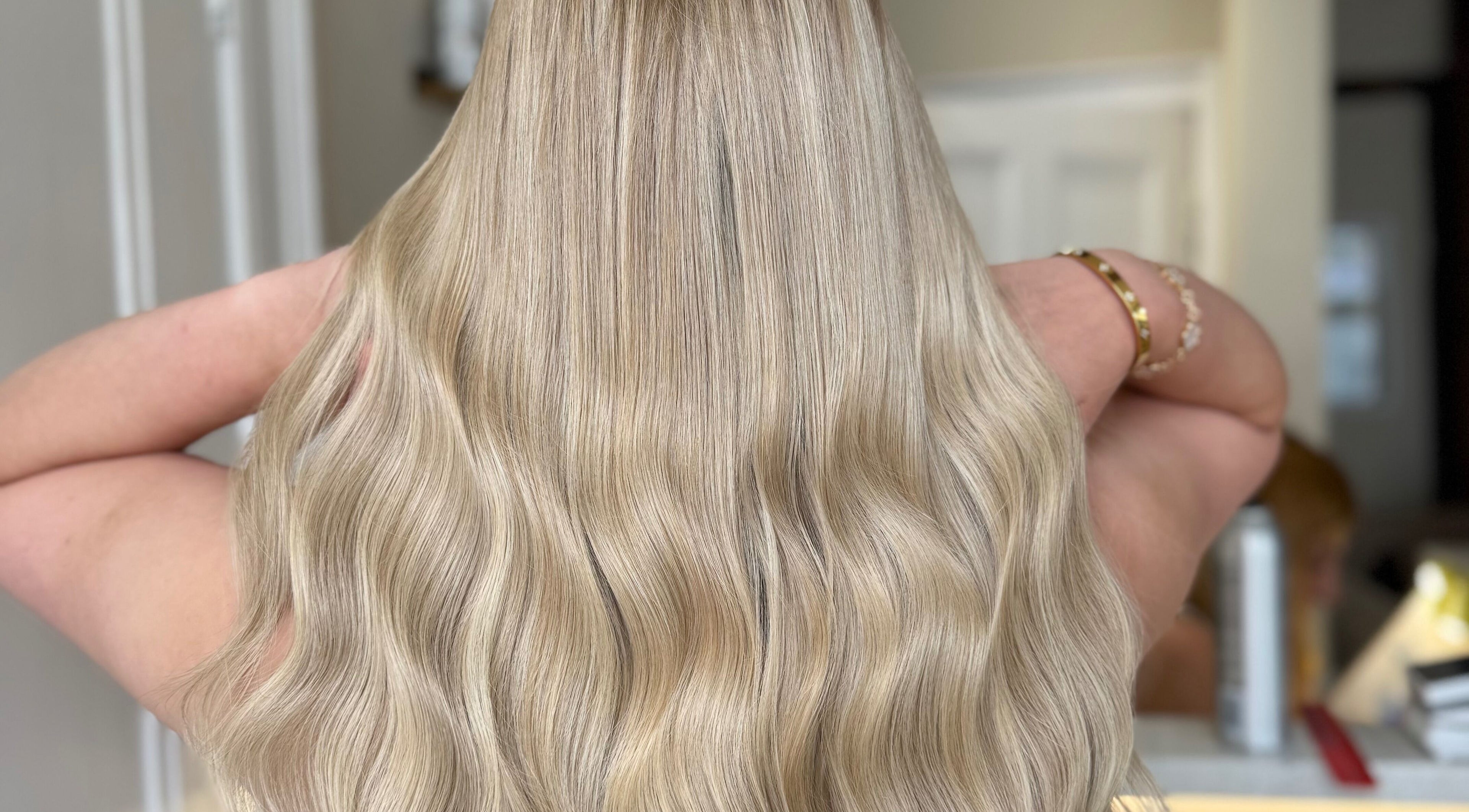 Long, blonde wavy hair styled at The Salon | Meg & Mabel in Hereford, England, GB.