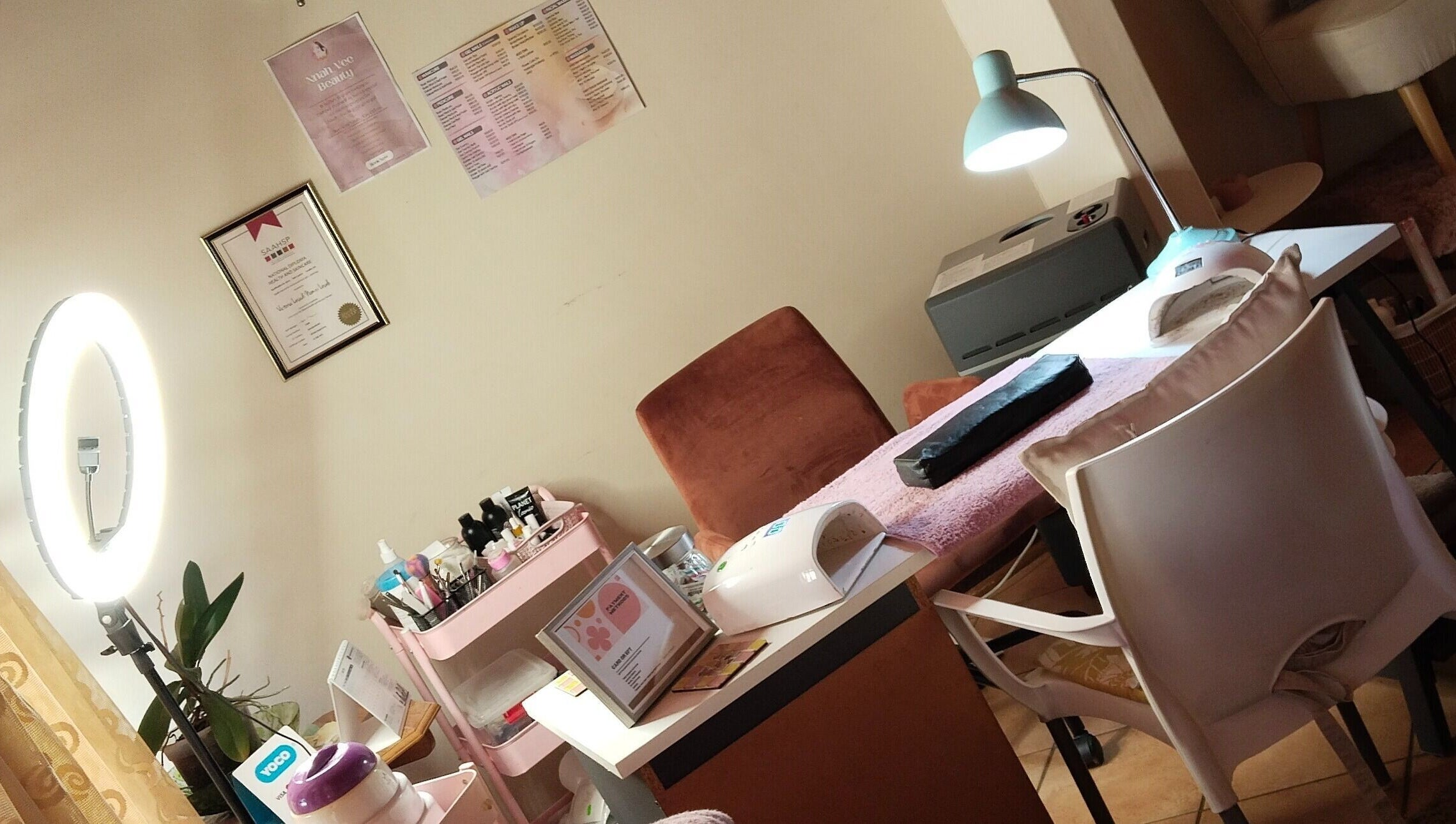 Nnah_Vee Beauty salon workspace in Kimberley, Northern Cape, ZA with professional nail tools and lighting.