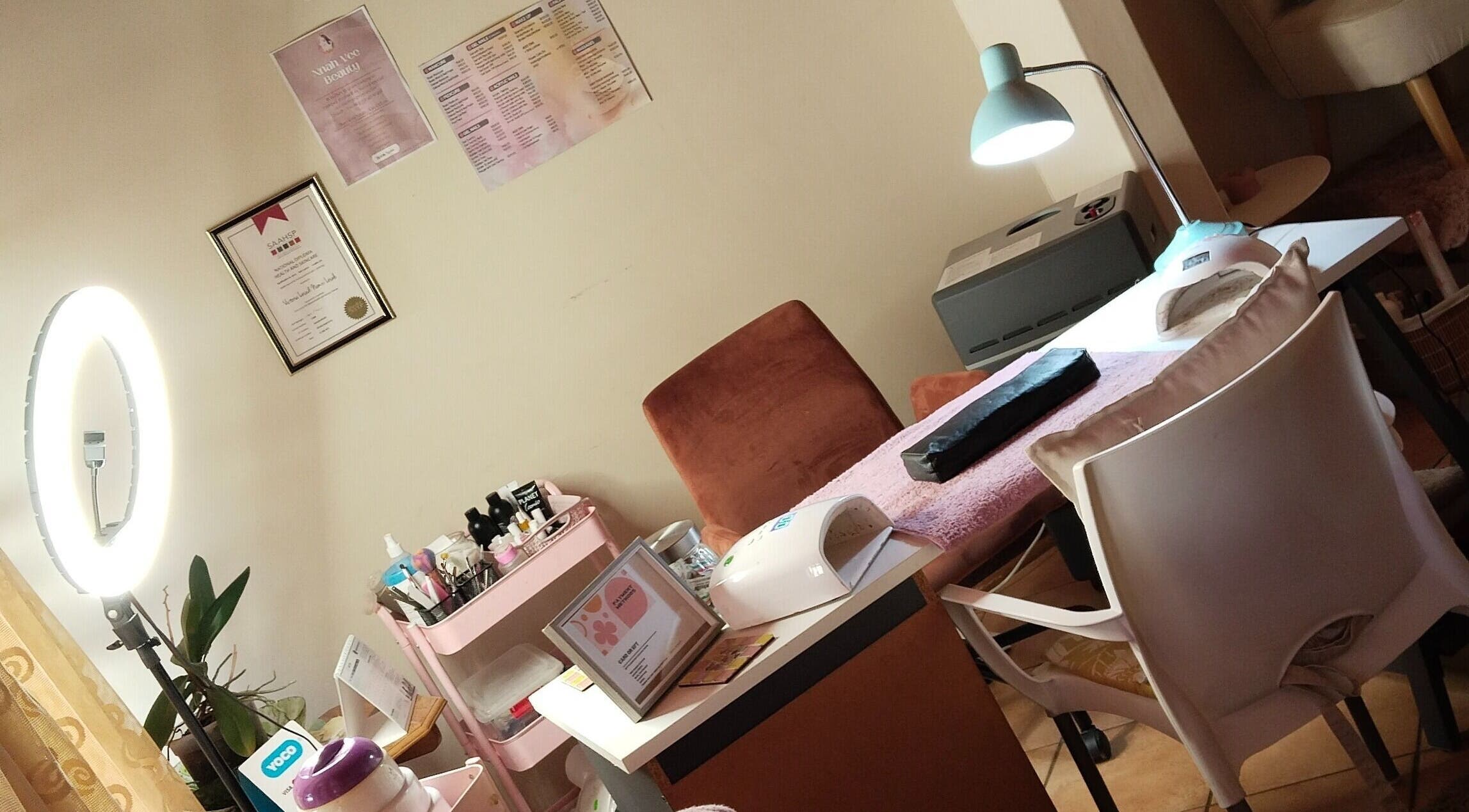 Nnah_Vee Beauty salon workspace in Kimberley, Northern Cape, ZA with professional nail tools and lighting.