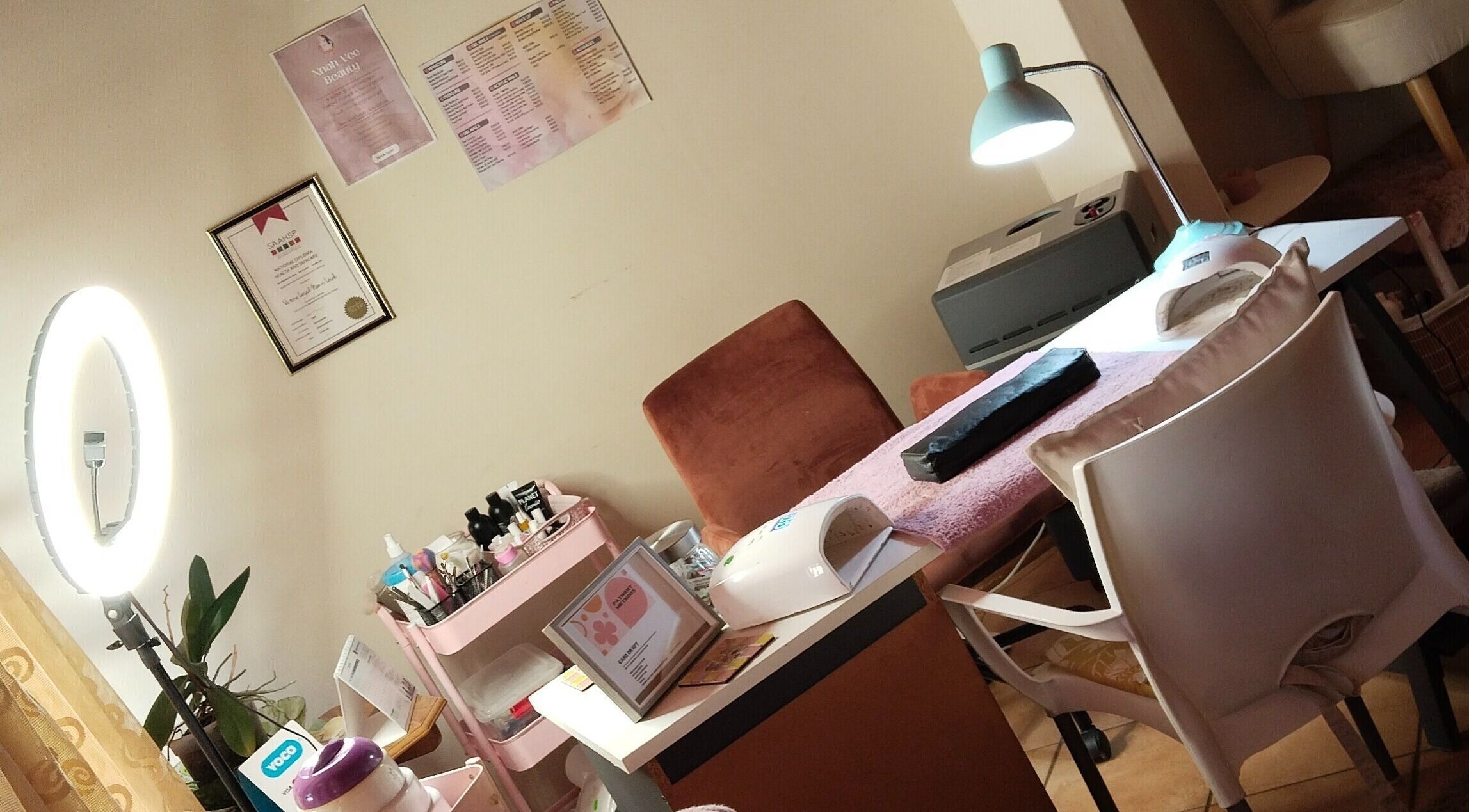 Nnah_Vee Beauty salon workspace in Kimberley, Northern Cape, ZA with professional nail tools and lighting.