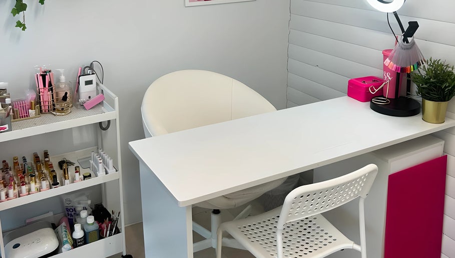 Modern beauty station at Lulah Lashes & Beauty, Blyth, England, GB, featuring a sleek white desk and chair.