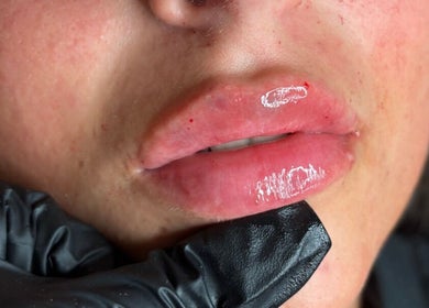 Close-up of glossy lips after treatment at Lulah Lashes & Beauty, Blyth, England, GB.