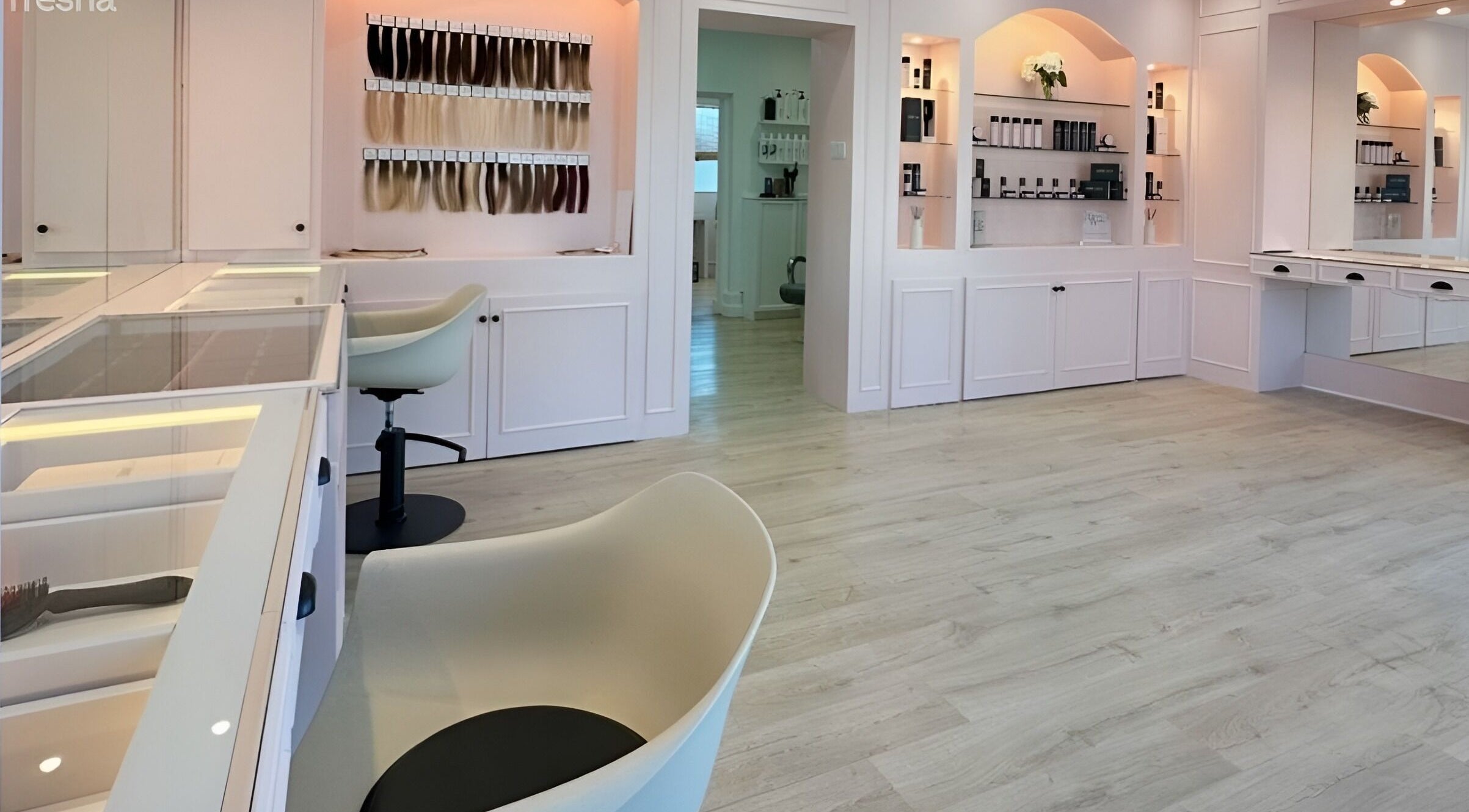 Modern salon interior at Dreamhair Extensions LTD, Shrewsbury, England, GB, showcasing sleek design and hair displays.