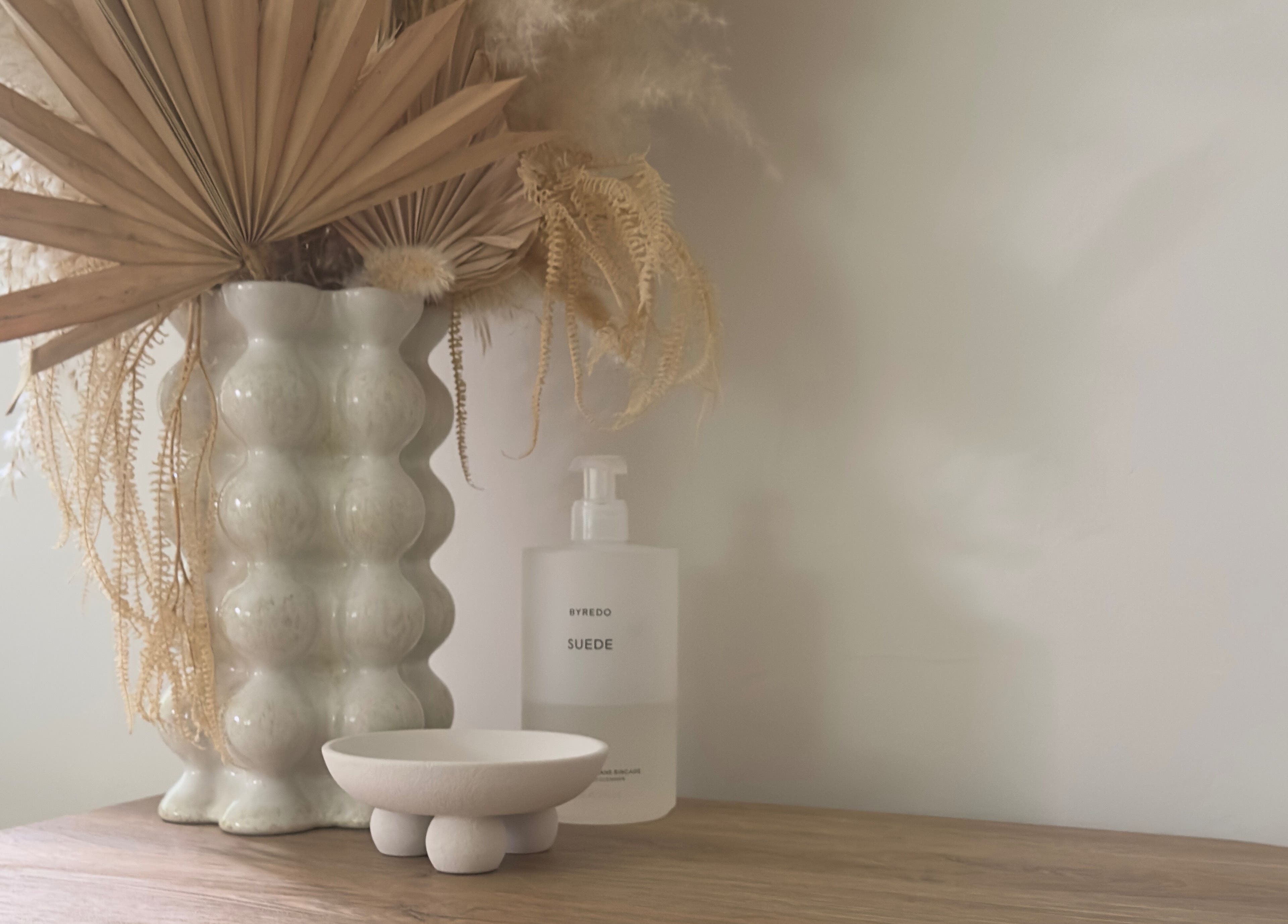 Elegant vase and skincare setup at Sculpt and Shape Kent Skin & Body Clinic, Kings Hill, England, GB.