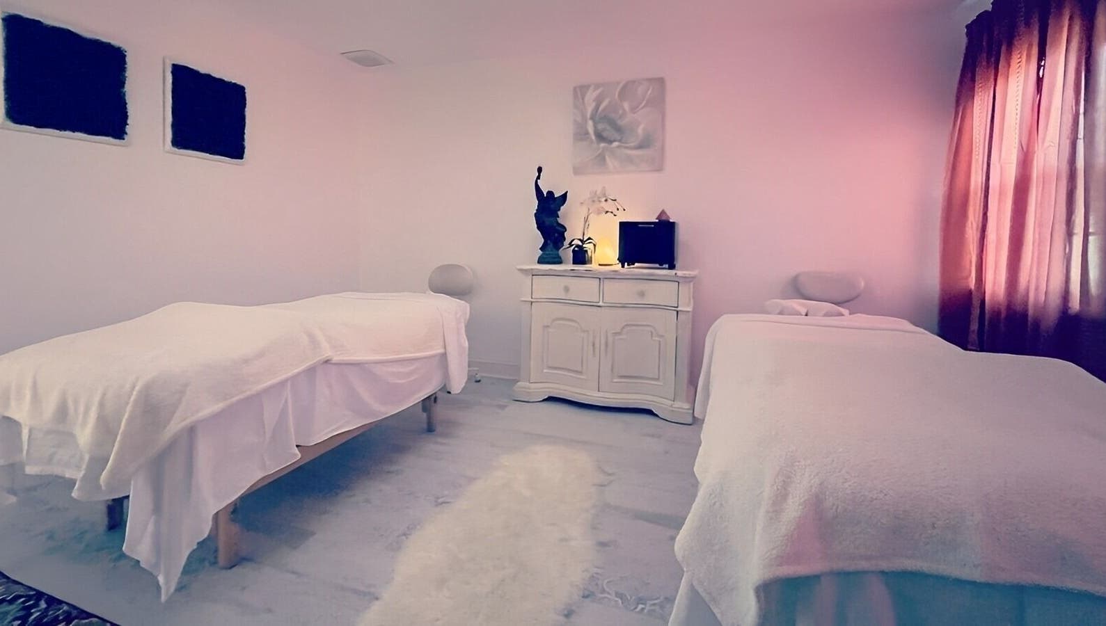 Cozy treatment room at Puritie Spa & Studios, Lahaska - New Hope, Pennsylvania, US with two massage tables.