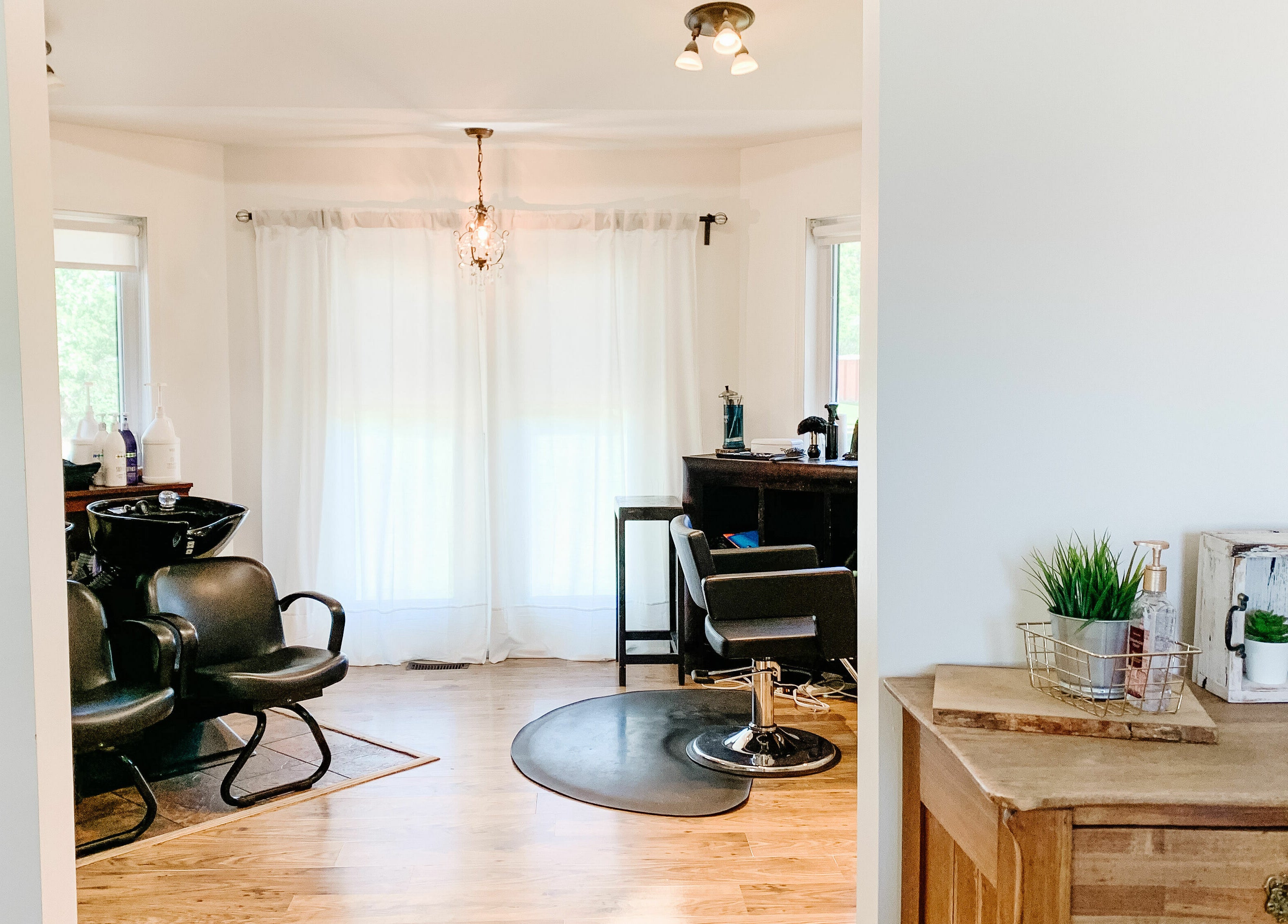 Chic interior view of Classic Impressions Salon in Grunthal, Manitoba, CA with stylish chairs and decor.