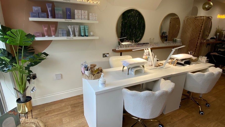 Cozy manicure station at Millie Manicurist in Heage, England, GB showcasing elegant decor and nail care products.