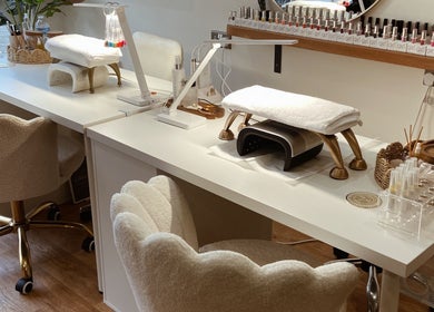 Chic nail stations at Millie Manicurist, Heage, England, GB, ready for professional treatments.