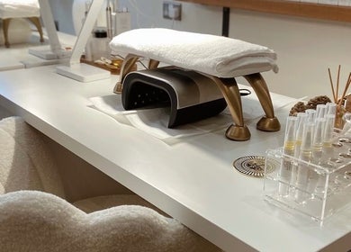 Stylish nail station setup at Millie Manicurist, Heage, England, GB showcasing a manicure workspace.