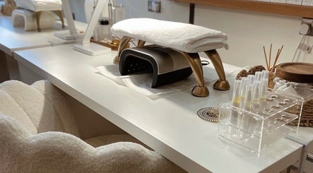 Stylish nail station setup at Millie Manicurist, Heage, England, GB showcasing a manicure workspace.