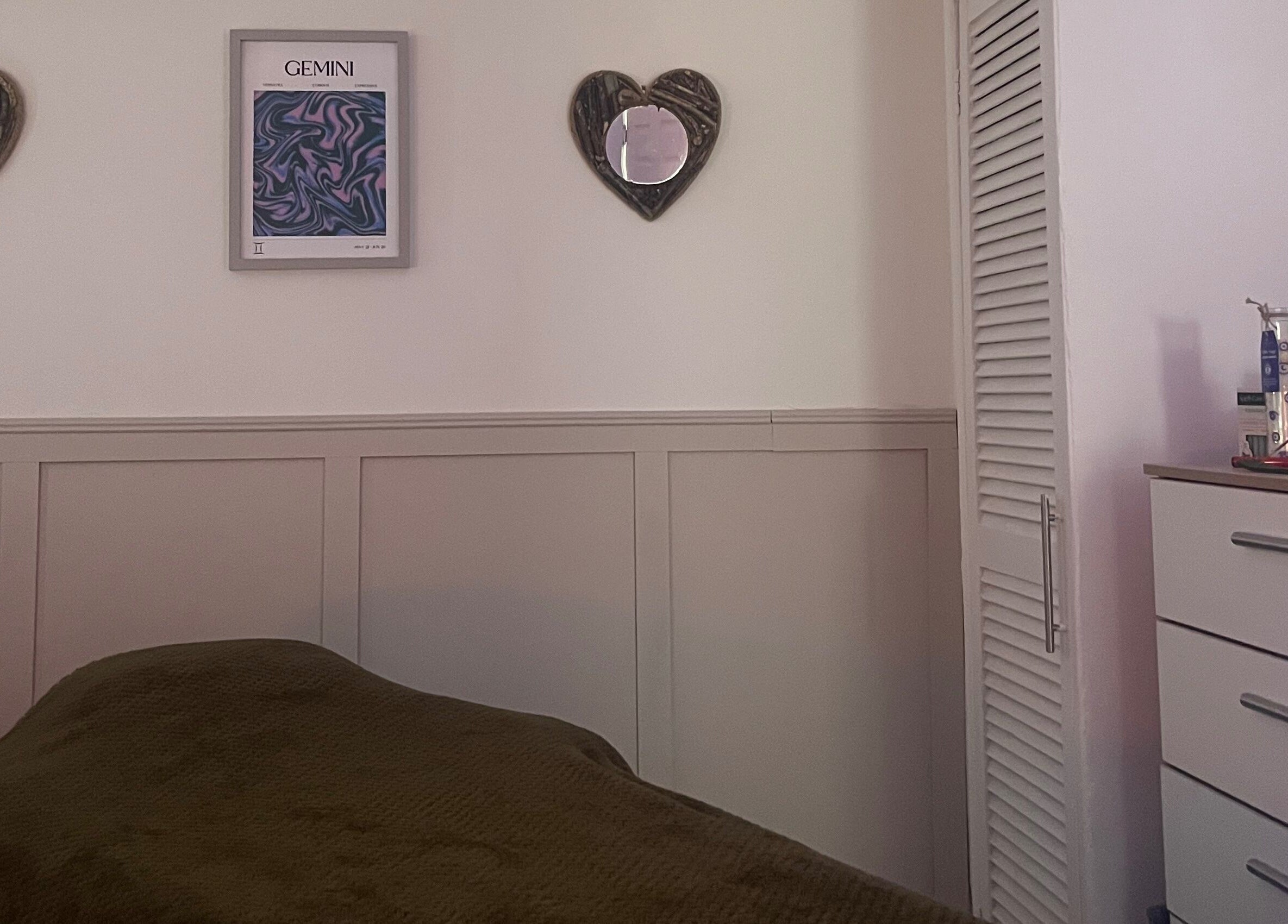 Cozy treatment room at Train Your Spirit, Wishaw, Scotland, GB with calming decor and comfortable massage table.