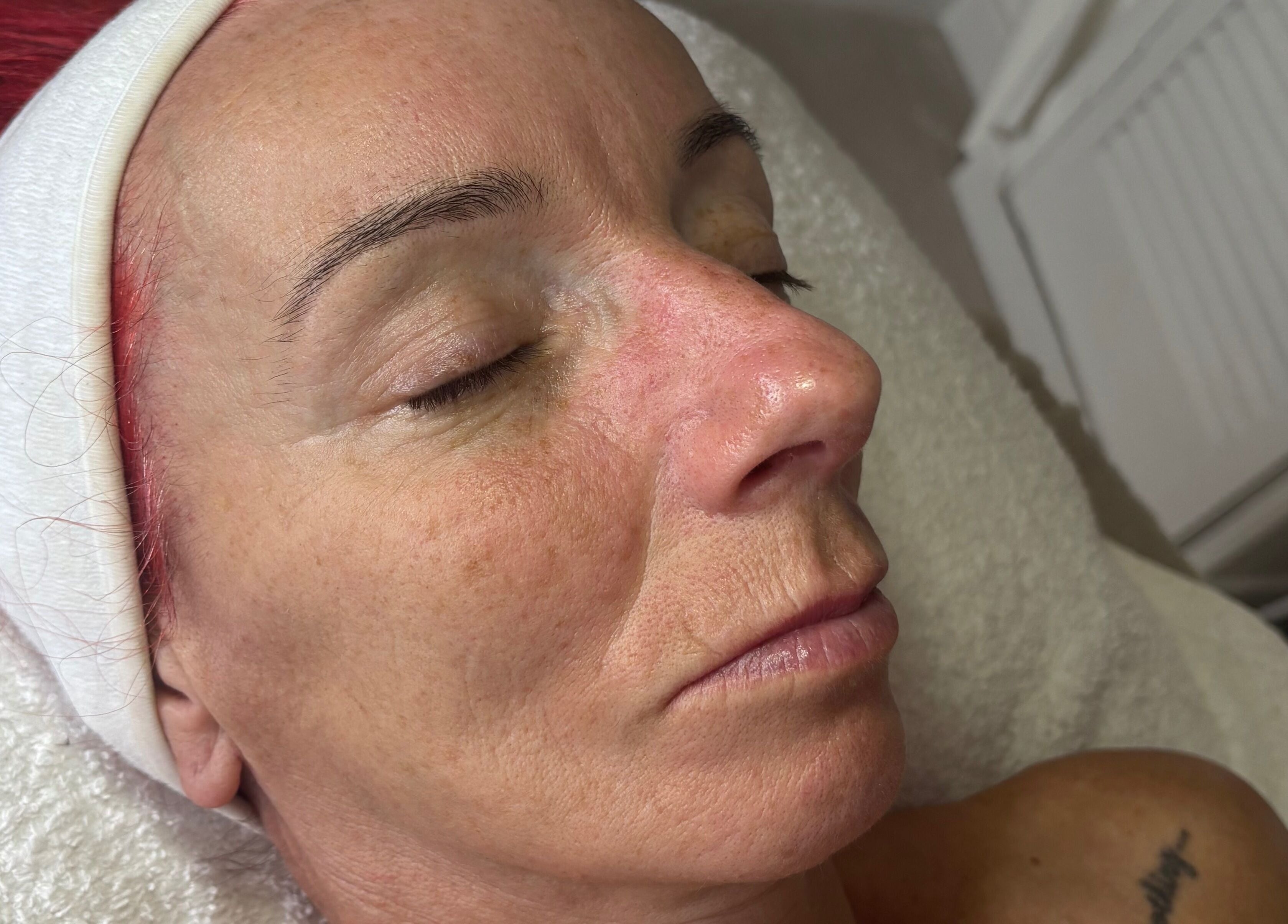 Close-up of a woman receiving facial treatment at Train Your Spirit in Wishaw, Scotland, GB.