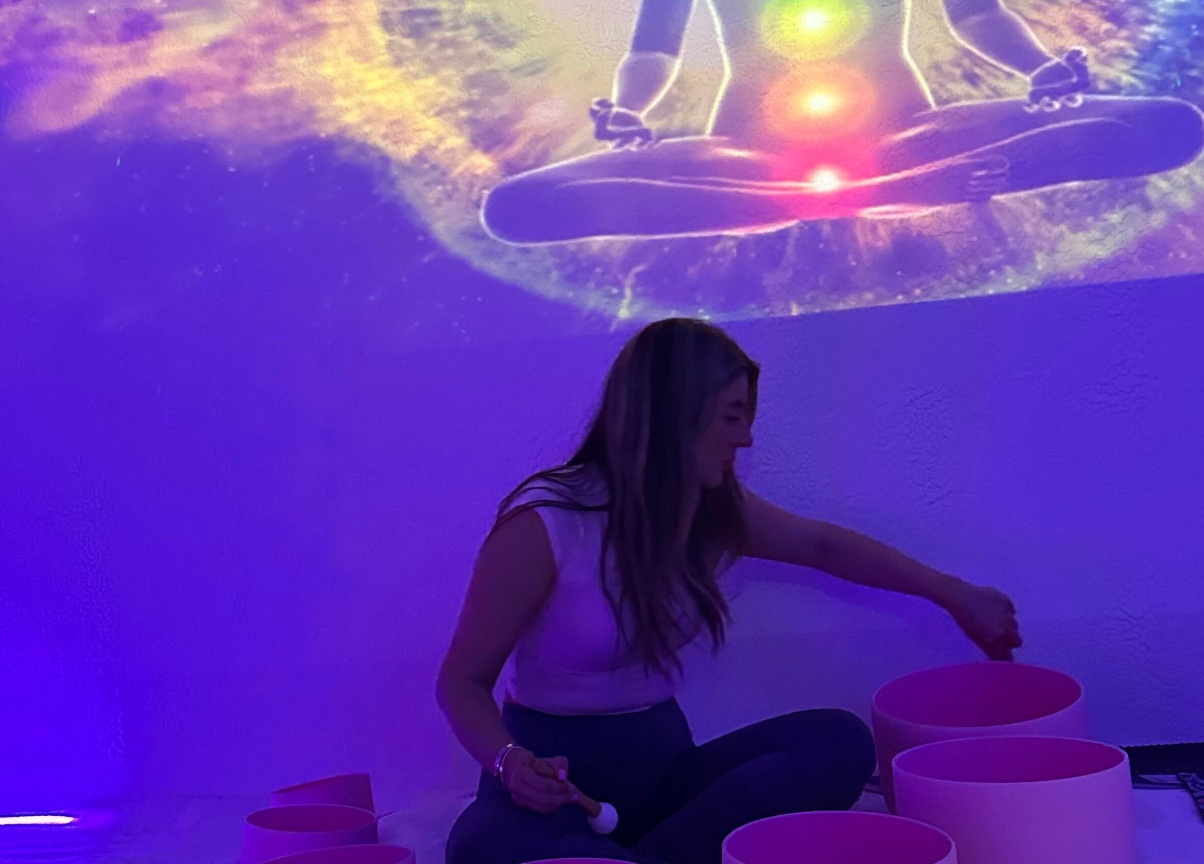 Meditative sound healing session at Train Your Spirit in Wishaw, Scotland, GB with chakra visuals.