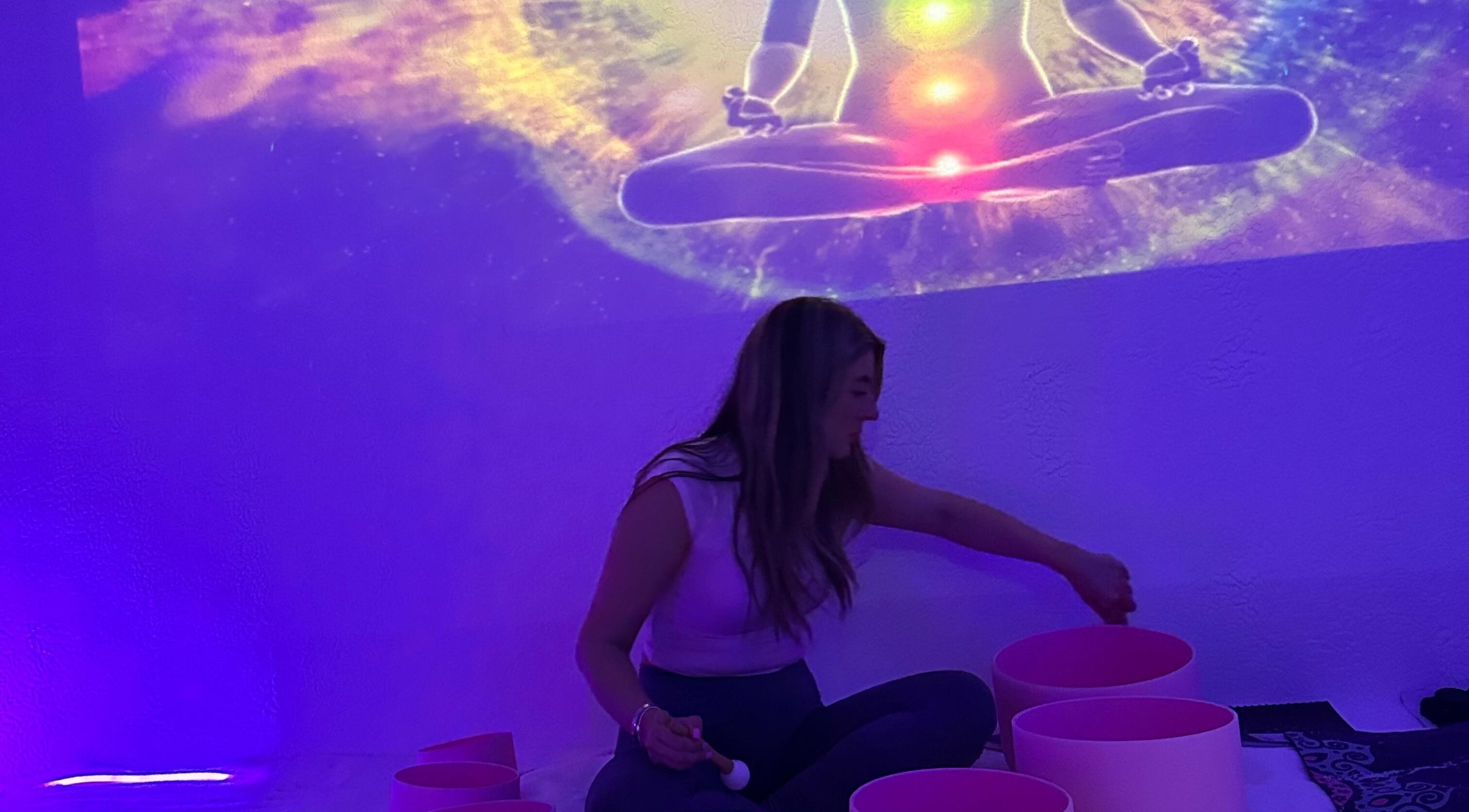 Meditative sound healing session at Train Your Spirit in Wishaw, Scotland, GB with chakra visuals.