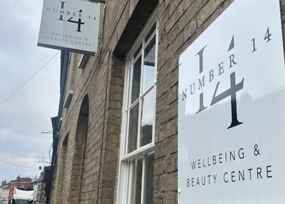 Exterior view of The Waxing Witch Suffolk signage in Sudbury, England, GB.