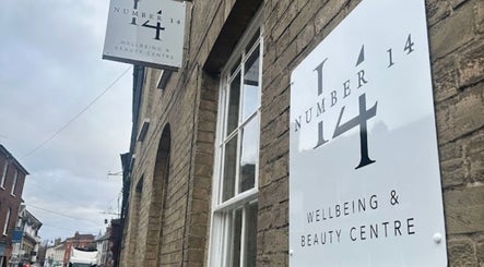 Exterior view of The Waxing Witch Suffolk signage in Sudbury, England, GB.