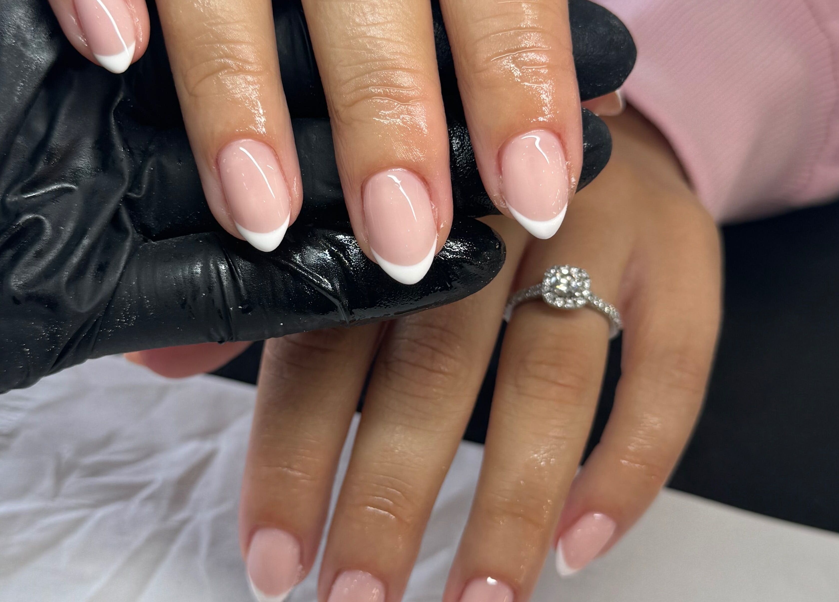 French manicure at Fawcett & Co., Leeds, England, GB showcasing a sparkling ring.