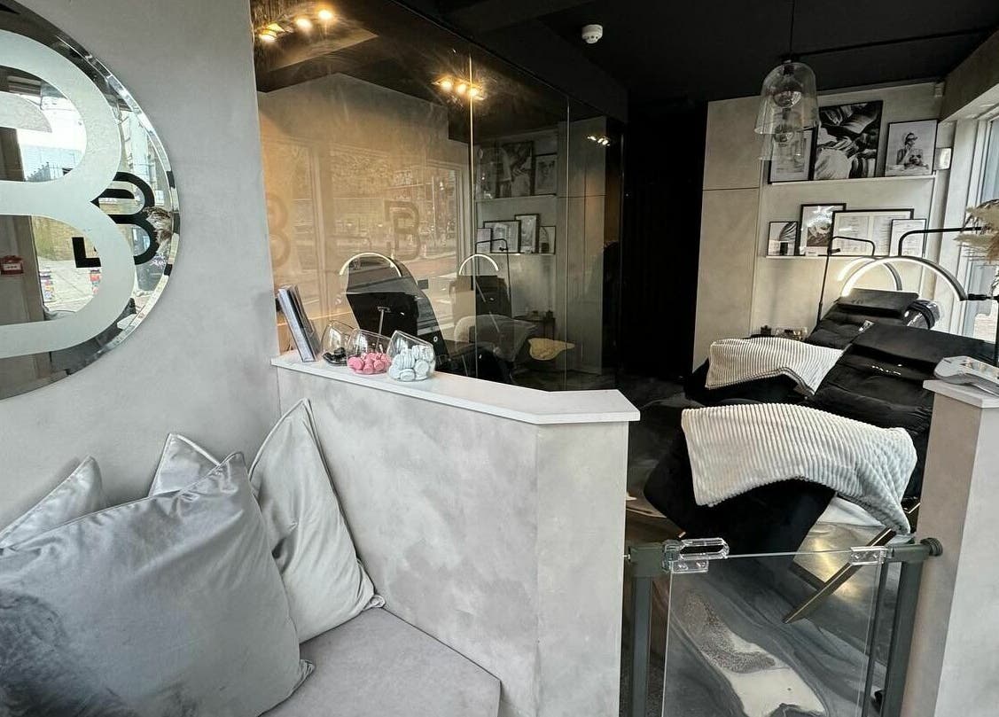 Modern interior of Face Base Brighton in Brighton And Hove, England, GB showcasing elegant treatment chairs.