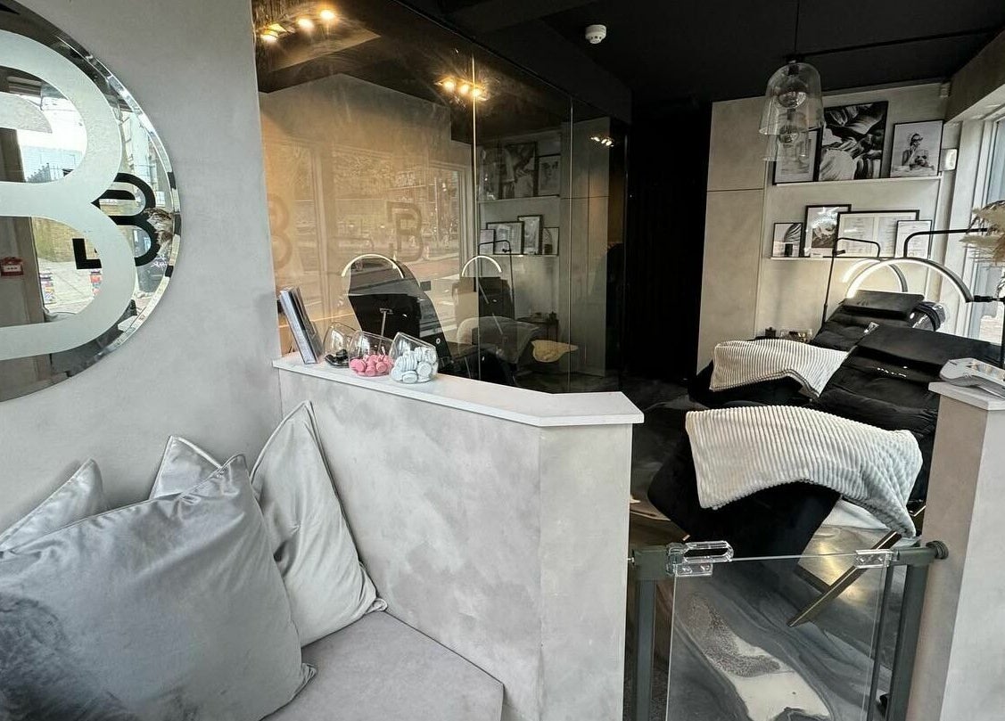 Modern interior of Face Base Brighton in Brighton And Hove, England, GB showcasing elegant treatment chairs.