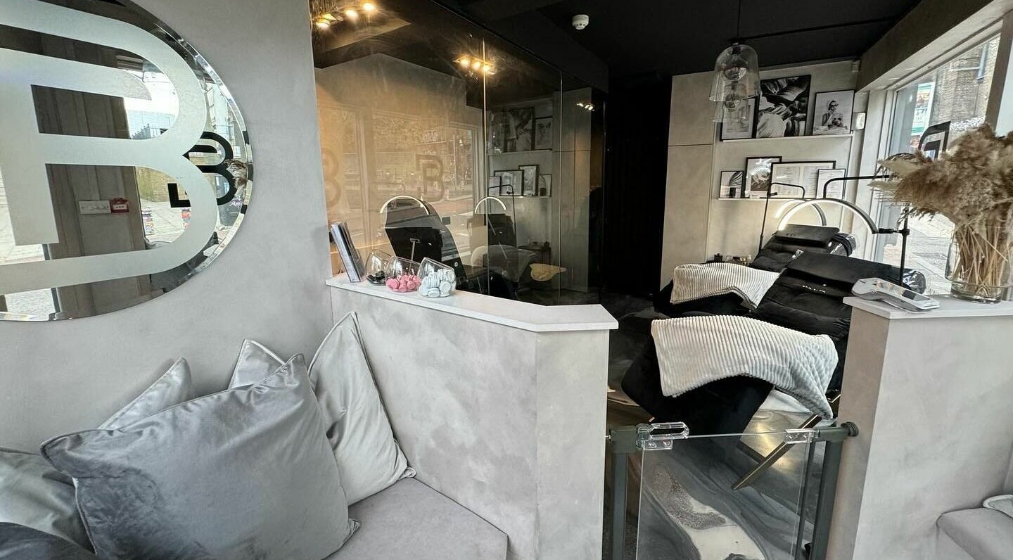 Modern interior of Face Base Brighton in Brighton And Hove, England, GB showcasing elegant treatment chairs.