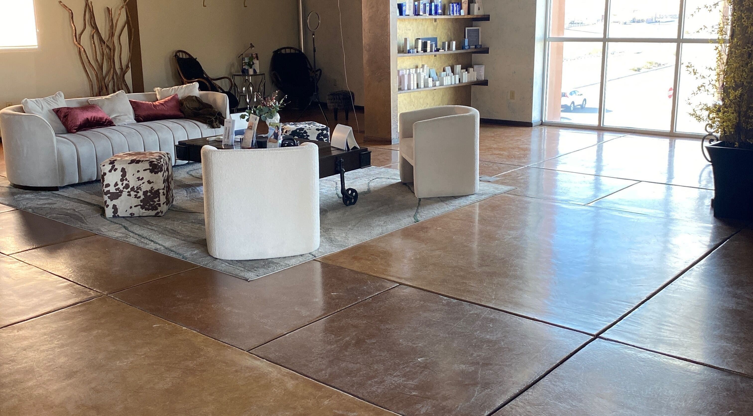 Elegant lounge area with sofas at LADA Beauty, Las Cruces, New Mexico, US.