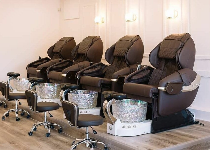 Luxurious pedicure chairs at Nails & Co. Windsor, Windsor, Ontario, CA, offering a premium spa experience.