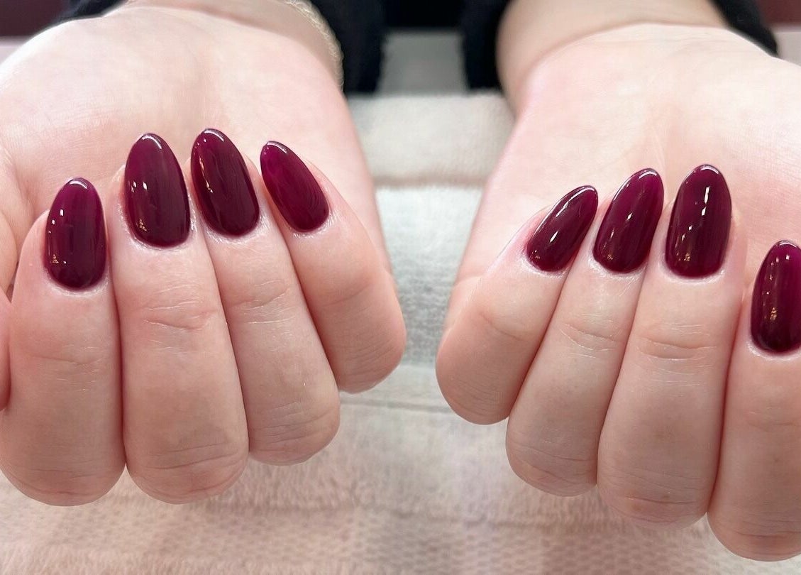 Elegant claret nails at Nails & Co. Windsor, offering luxury manicures in Windsor, Ontario, CA.