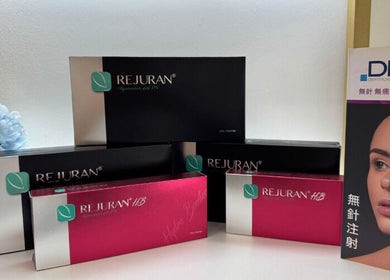 Rejuran beauty products displayed at Beautyhood on Hong Kong Island, HK with decorative flowers.