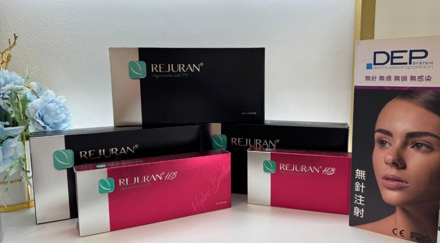 Rejuran beauty products displayed at Beautyhood on Hong Kong Island, HK with decorative flowers.