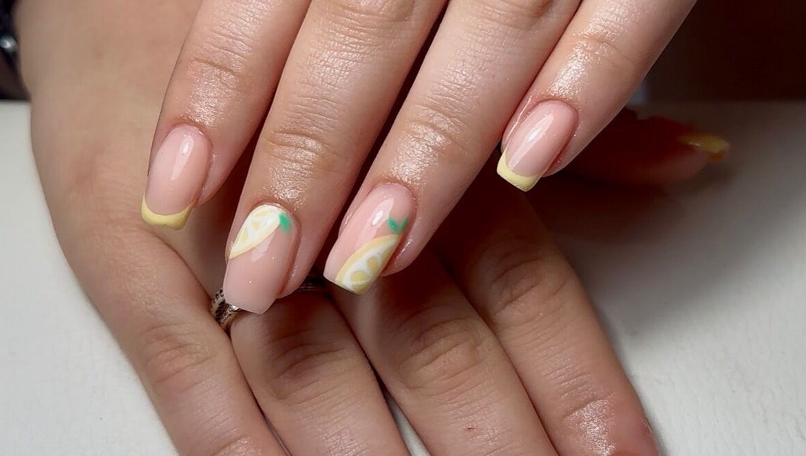 Lemon-themed nail art at The Mani Lounge Cheshire, Congleton, England, GB, showcasing distinctive citrus design.