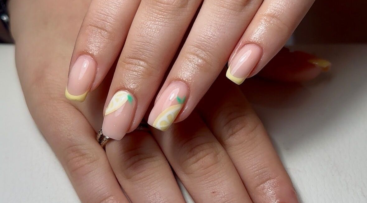 Lemon-themed nail art at The Mani Lounge Cheshire, Congleton, England, GB, showcasing distinctive citrus design.