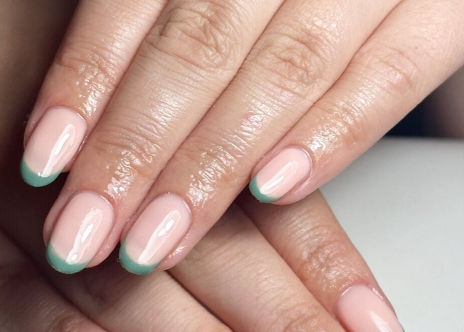 Elegant manicure with green tips at The Mani Lounge Cheshire, Congleton, England, GB.