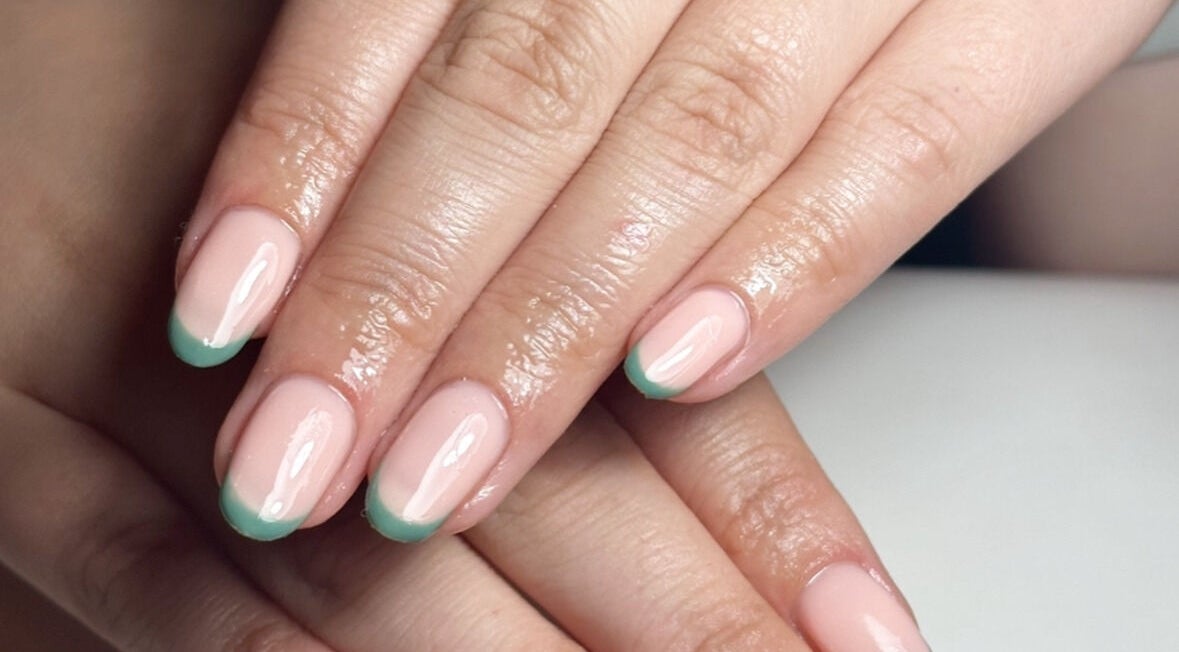 Elegant manicure with green tips at The Mani Lounge Cheshire, Congleton, England, GB.