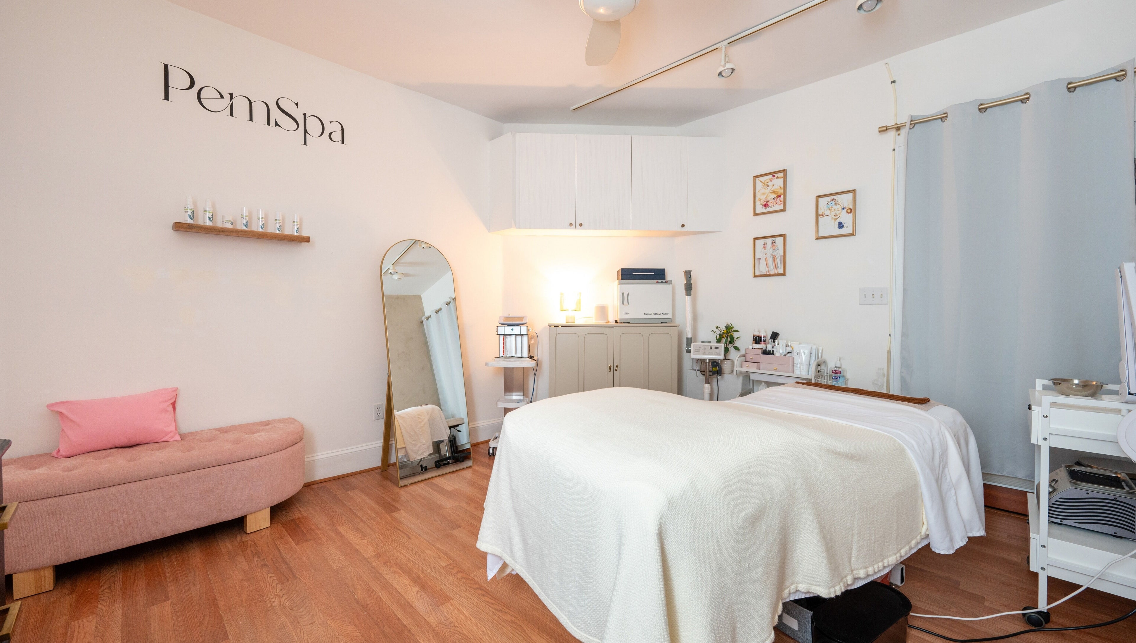 Relaxing spa room at PemSpa in Newton, Massachusetts, US featuring a treatment bed and elegant decor.