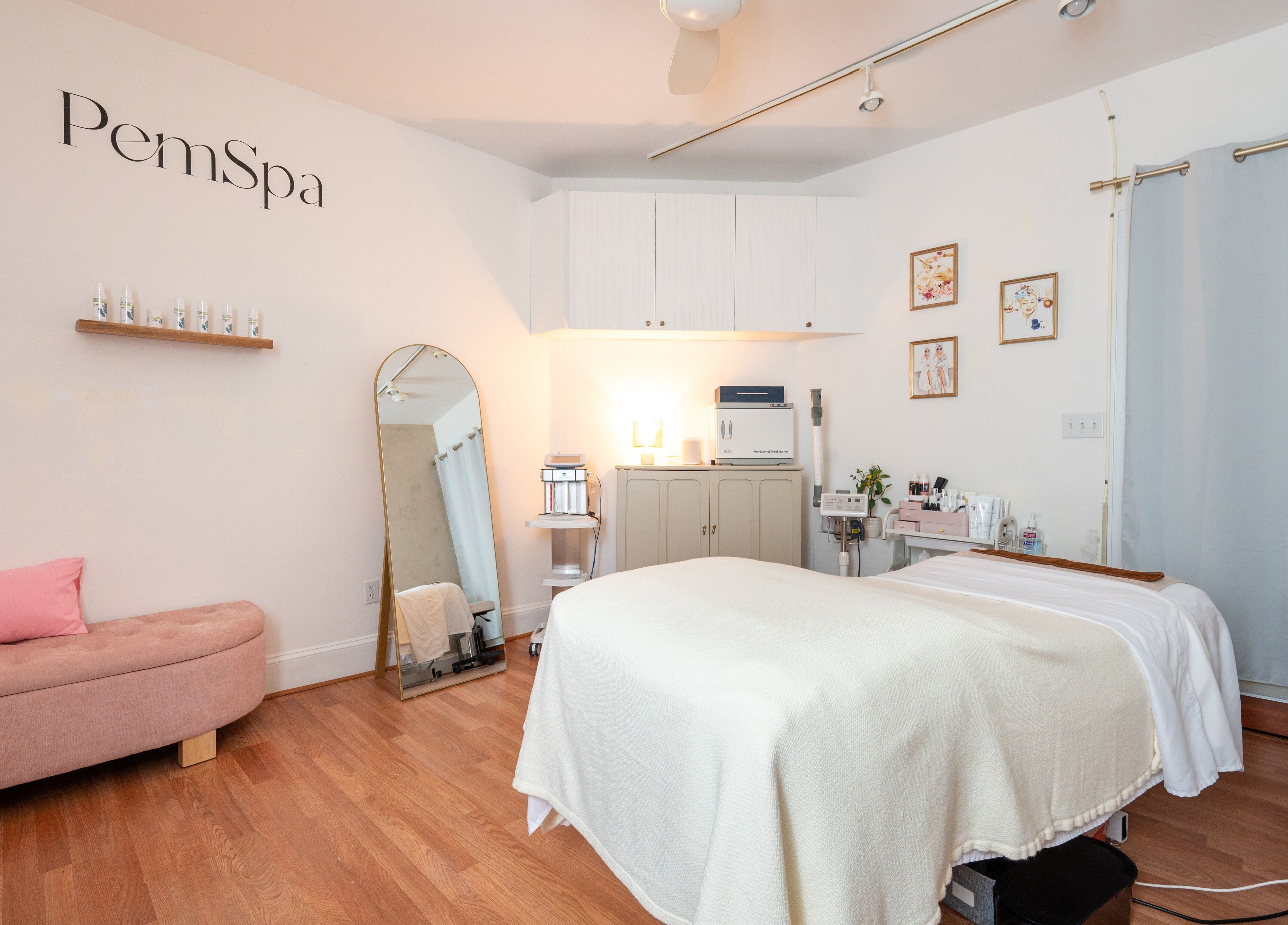 Relaxing spa room at PemSpa in Newton, Massachusetts, US featuring a treatment bed and elegant decor.