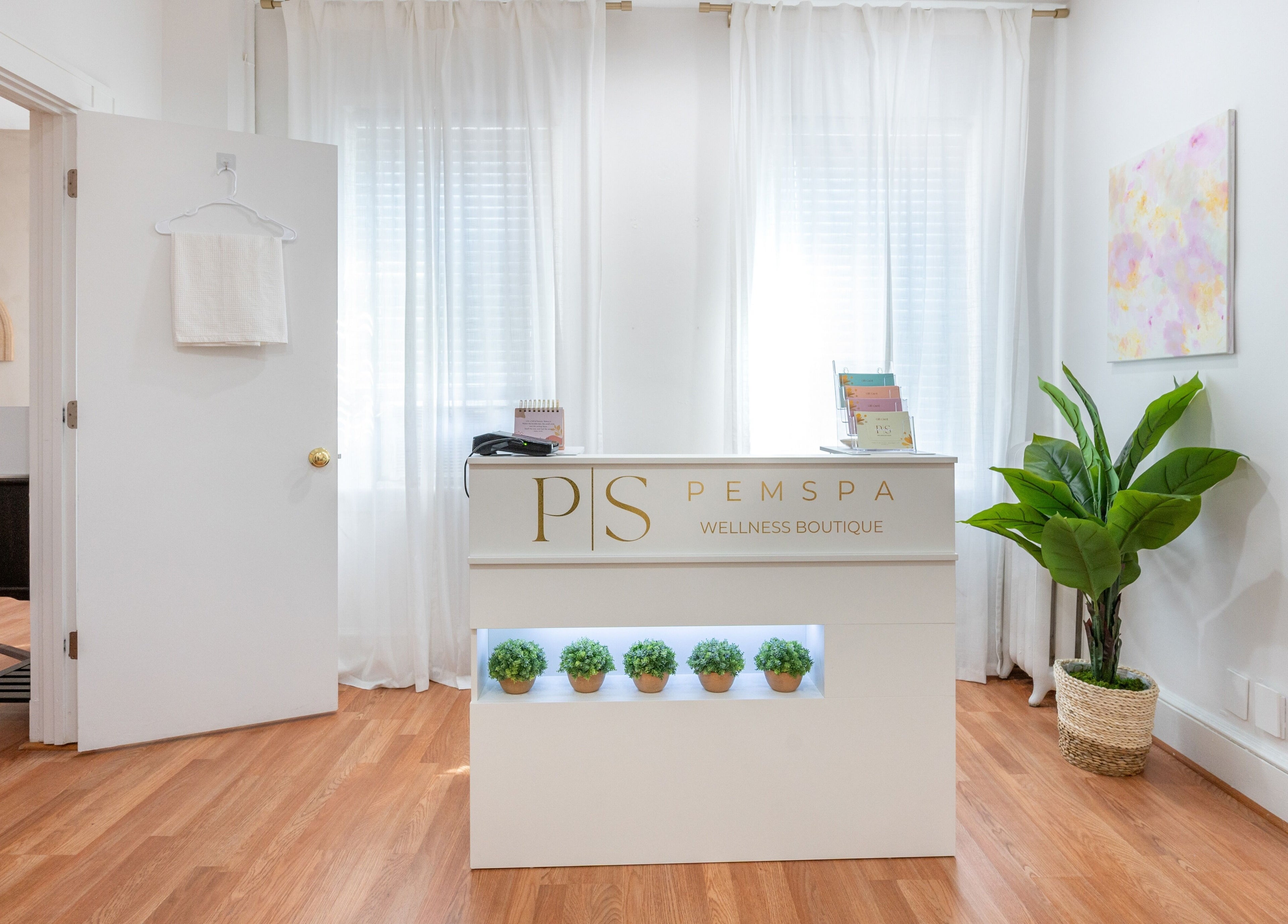 Elegant PemSpa reception area with wooden floors, Newton, Massachusetts, US.
