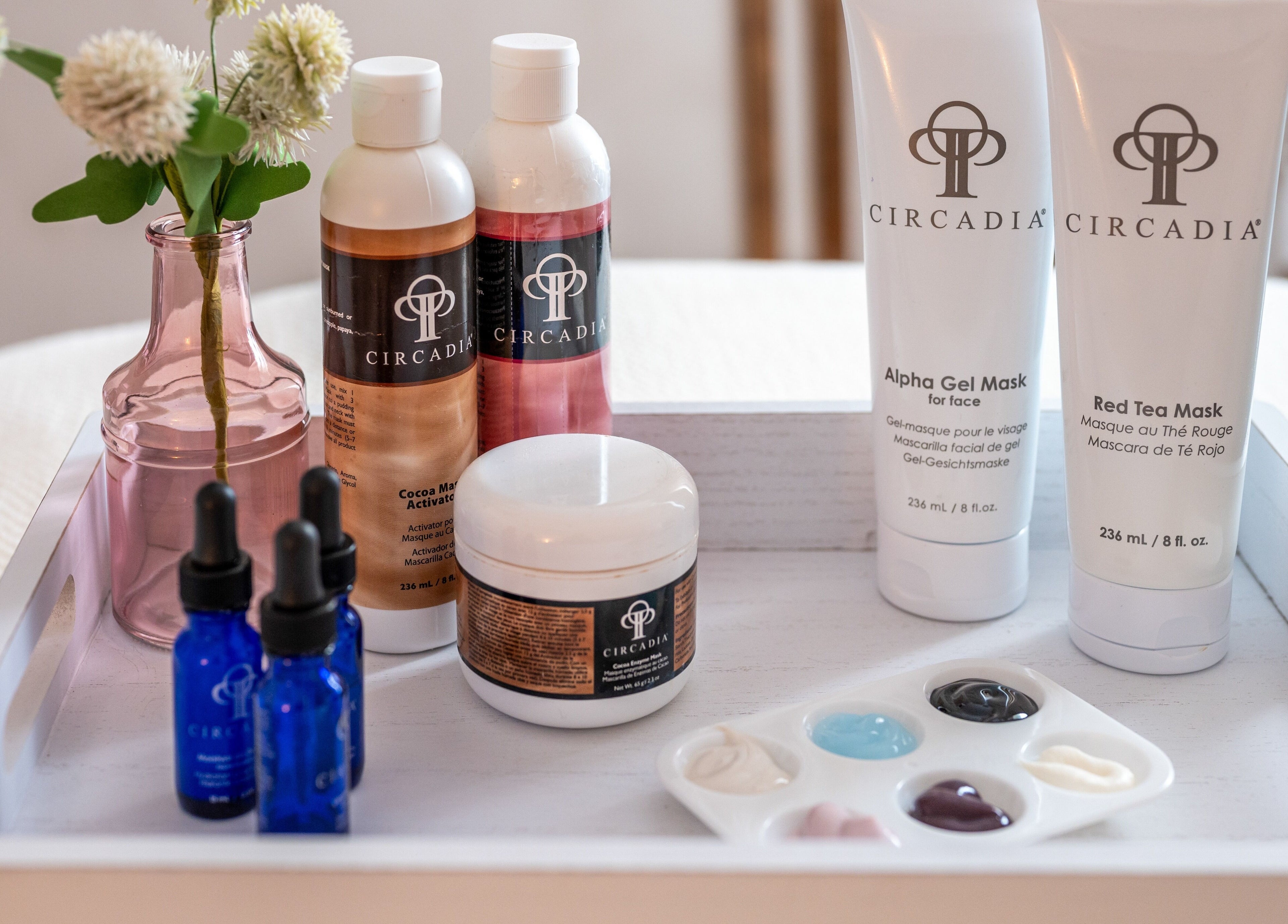 Beauty products tray at PemSpa, Newton, Massachusetts, US, featuring a variety of skincare items.