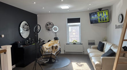 Modern barber shop interior at Leigh the Barber in Barrow in Furness, England, GB, showcasing elegant decor.