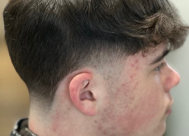 Close-up of a fade haircut by Leigh the Barber in Barrow in Furness, England, GB.