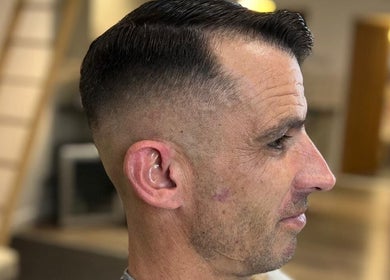 Close-up of a fresh fade haircut at Leigh the Barber, Barrow in Furness, England, GB. Modern barbering style.