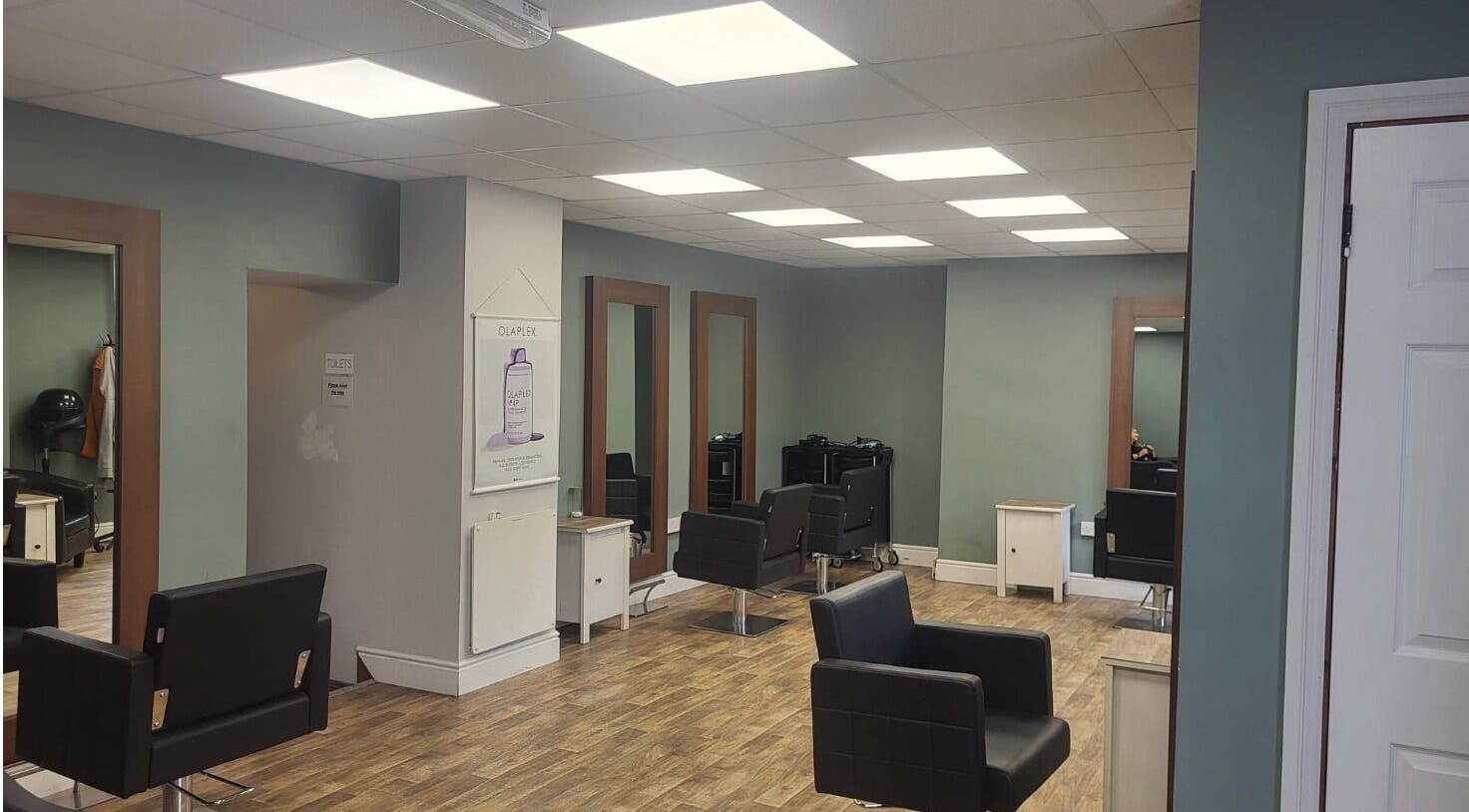 Modern interior of Cutting Edge Hair Studio Edenderry, Edenderry, County Offaly, IE with sleek styling chairs.