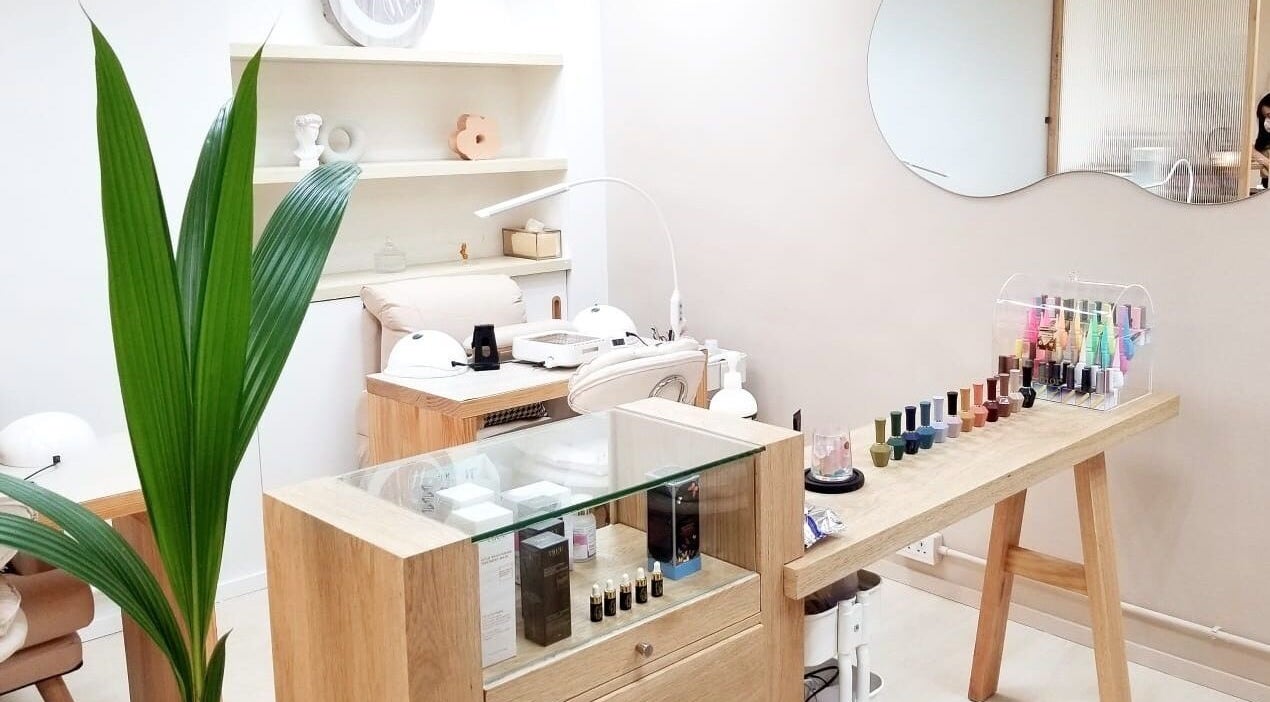 Stylish nail station at Milky Way Nail Studio, Central, 香港島, HK featuring vibrant polish selection.