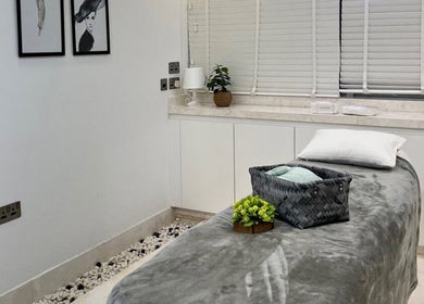 Massage room at Sulit Hair and Spa - Bausher, Muscat, Muscat Governorate, OM with serene decor.