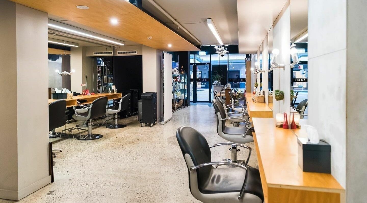 Stylish interior of Louka and Co Hair Salon, Sydney, New South Wales, AU. Modern design with spacious seating.