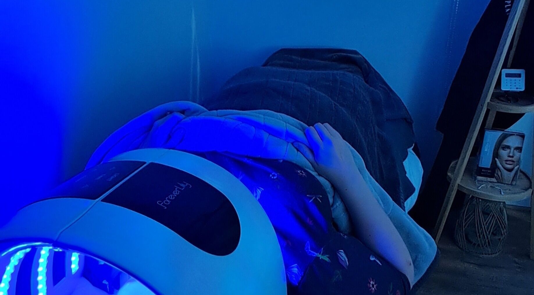 Relaxing LED light therapy session at Skin Revision, Douglas, IM, enhancing skin wellness and rejuvenation.