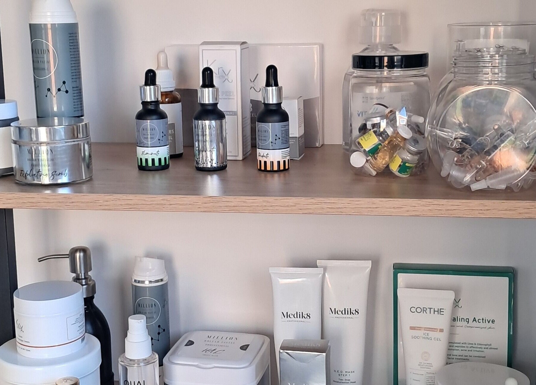 Beauty products display at Skin Revision, Douglas, IM. Premium skincare and wellness essentials highlighted.