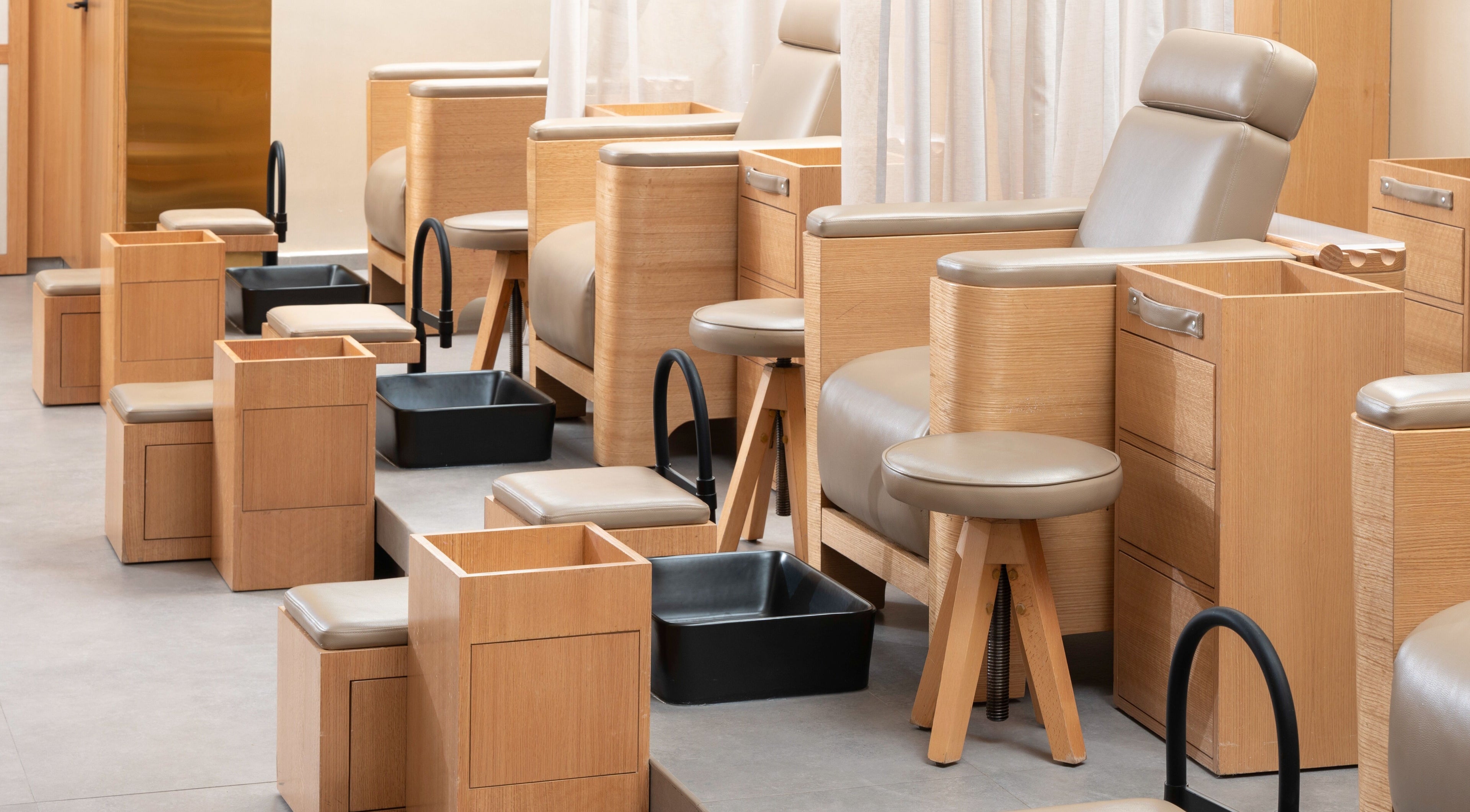 Vernis Nail Spa - Al Nakheel Branch in Riyadh features luxurious seating for ultimate relaxation.