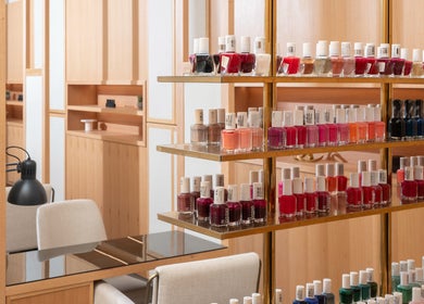 Vibrant nail polish display at Vernis Nail Spa - Al Nakheel Branch, Riyadh, Riyadh, SA. Chic and modern interior.
