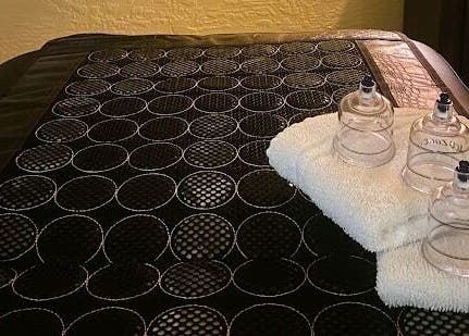 Cupping tools and towels at Massage Therapy Studio in Great Falls, Montana, US for holistic treatment.